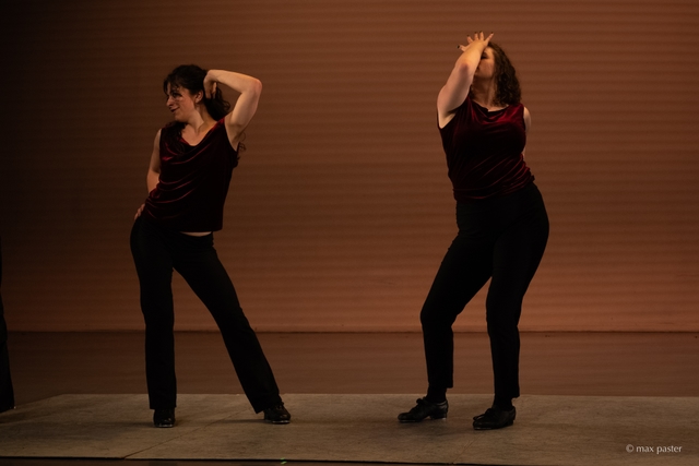 Hannah and another dancer pose dramatically.